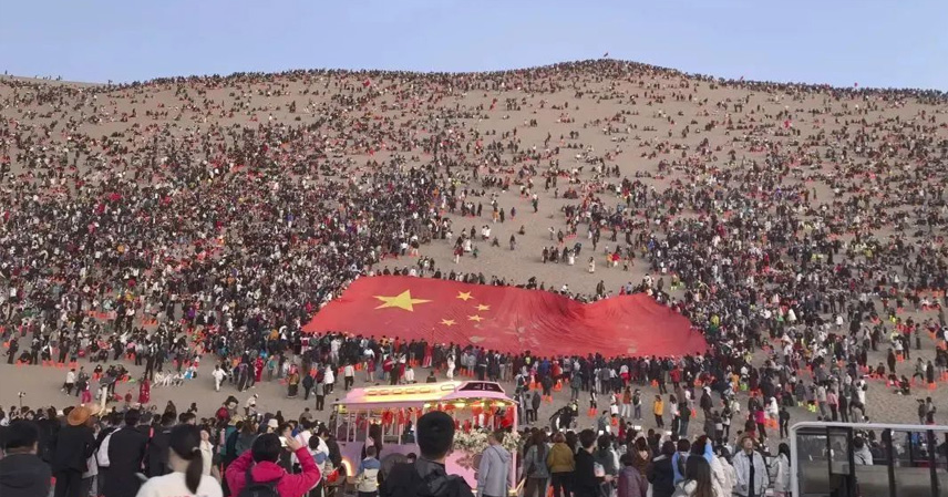 Dunhuang's Desert Overload: Golden Week Turns Solitude into a Sea of Sand-Swept Sightseers